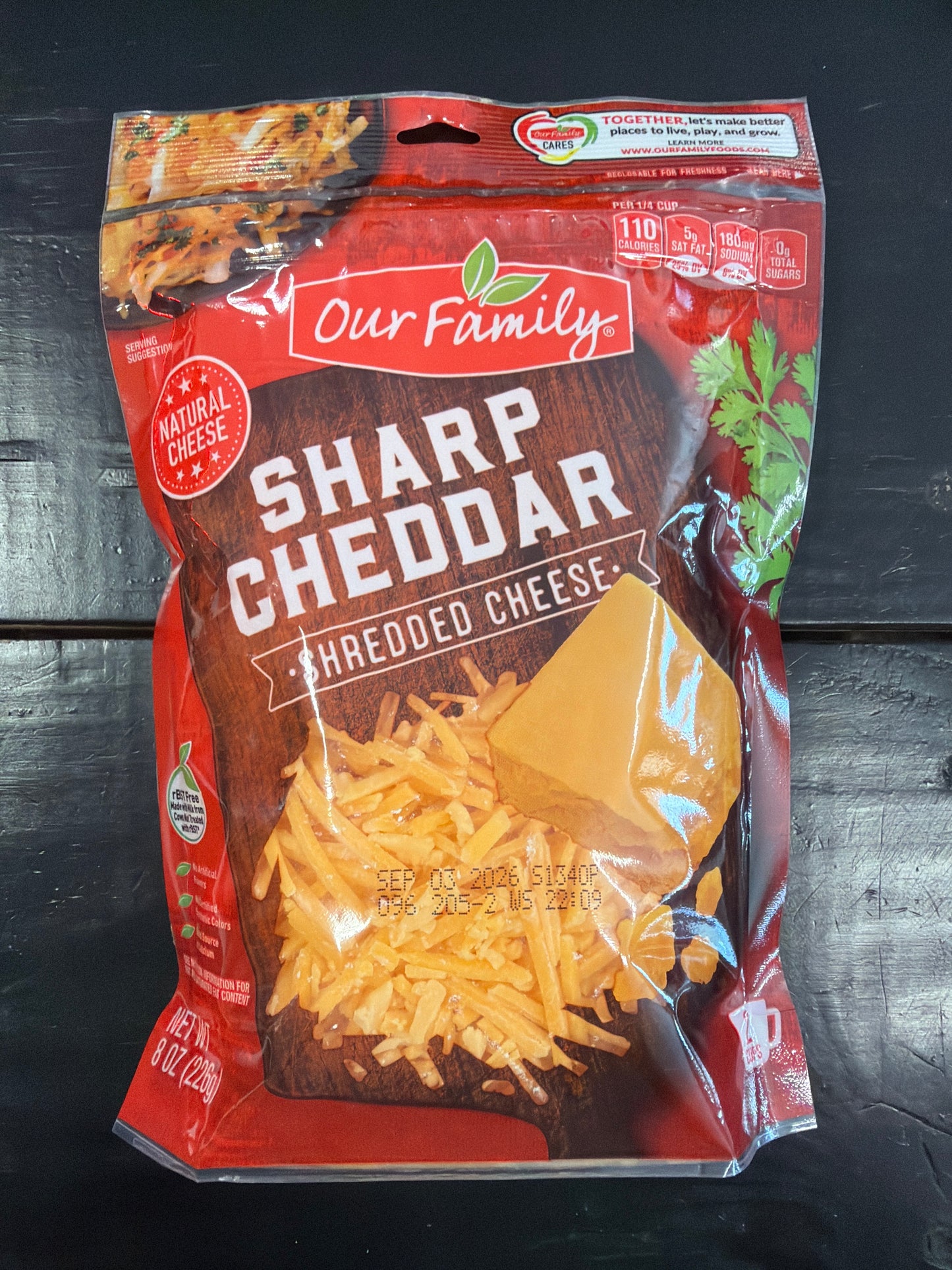 Our family shredded sharp cheddar 8oz